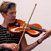 Sara Caswell playing her hardanger fiddle